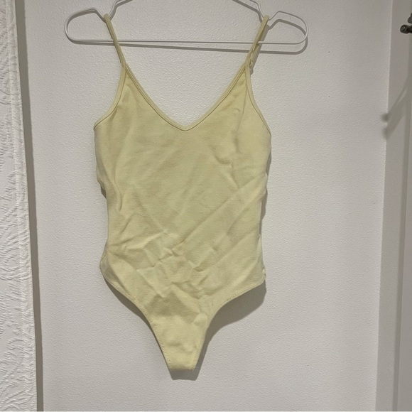 Aritzia Tops - Aritzia Sunday Best Yellow Bodysuit